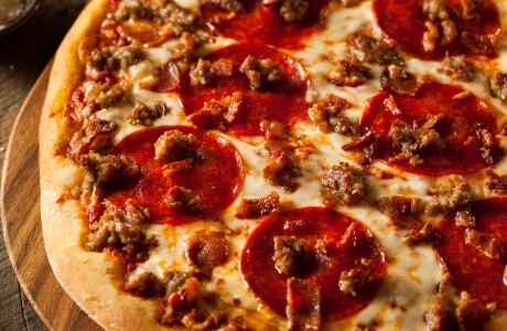 Meat topped pizza - retail and takeaway nutritional information